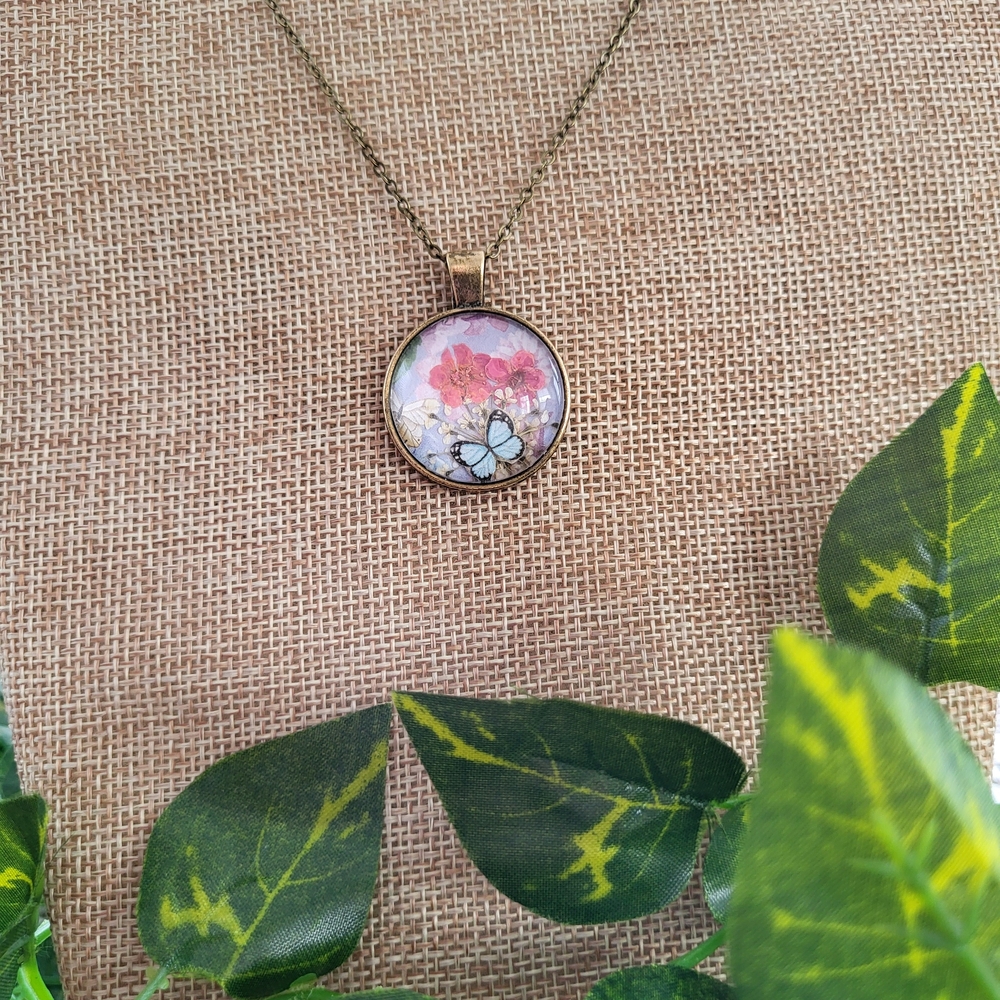 Charming Brass Floral Pendant Necklace with Pink Flowers And Butterfly Accent